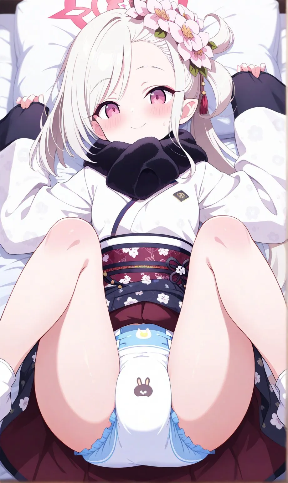 A diapered girl with a flower in her hair is in the position for a diaper change.