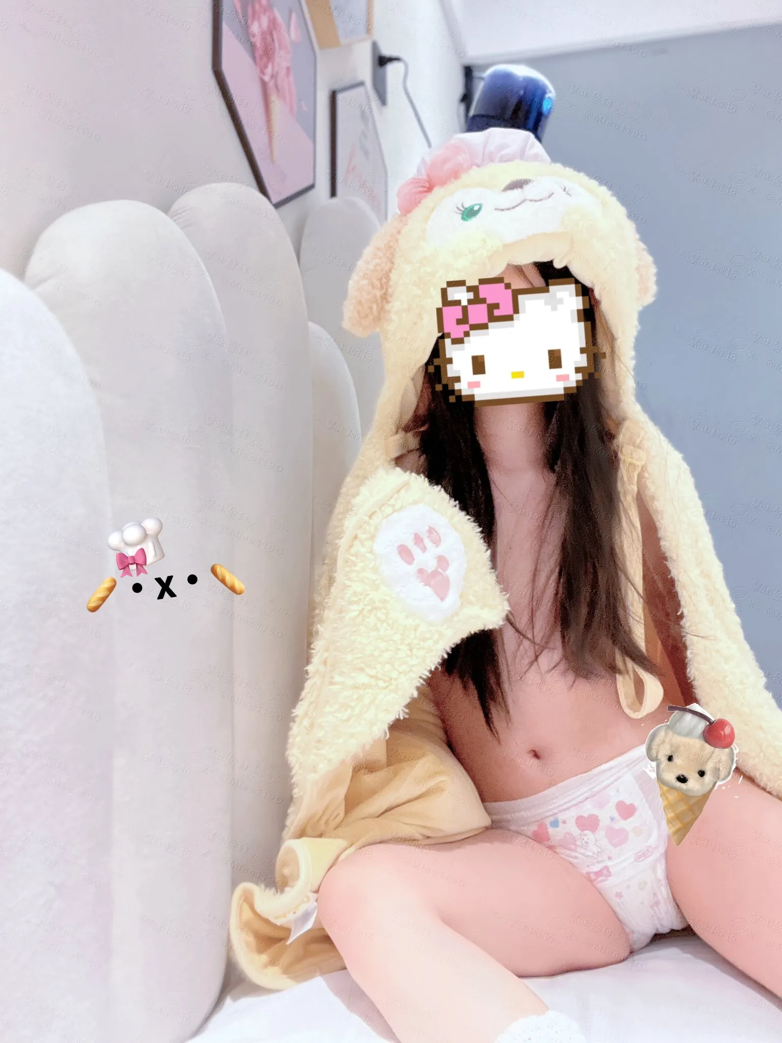 A little girl in a cute robe wearing a diaper