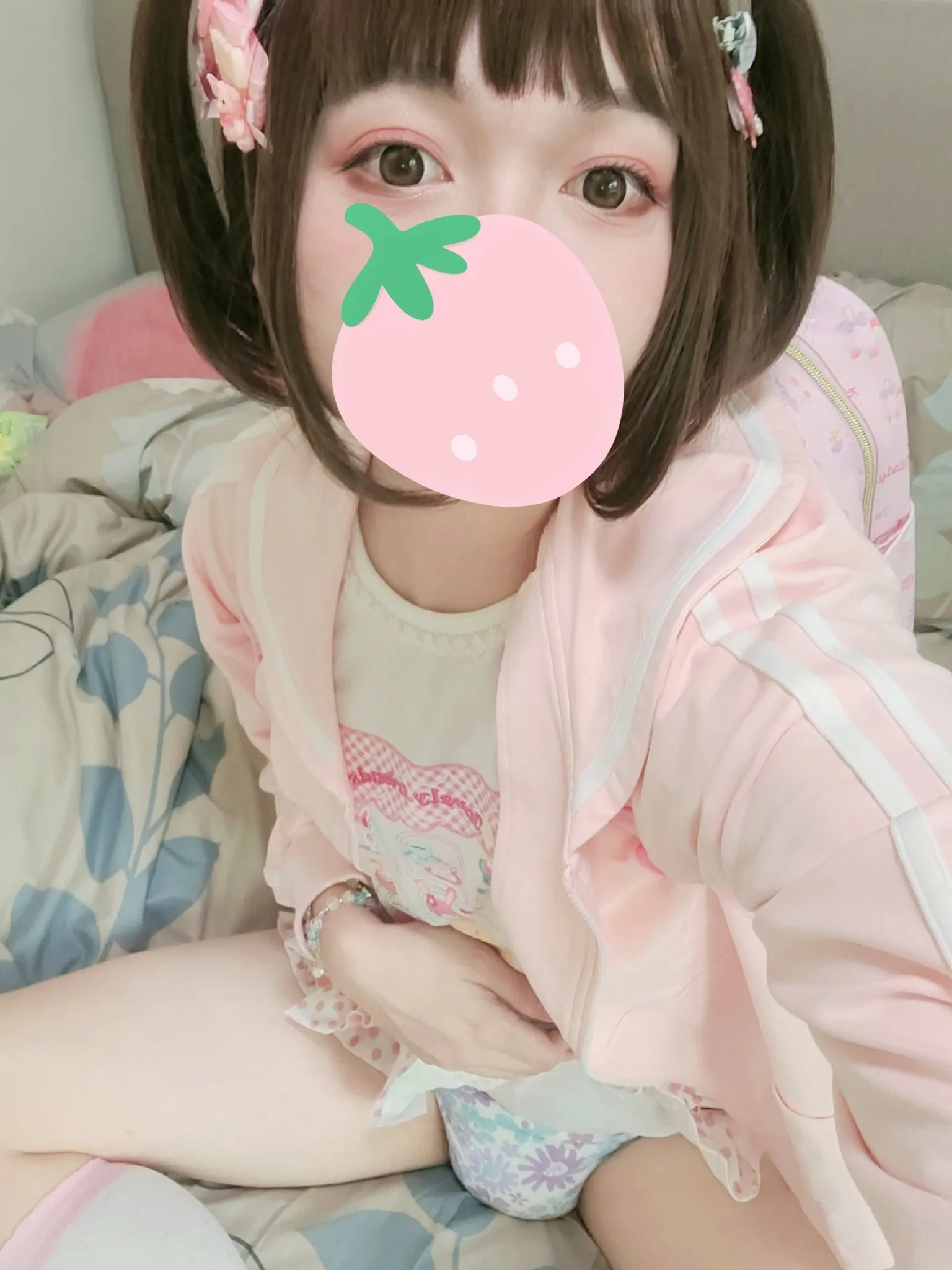 ABDL girl taking selfies while showing off her diaper in bed