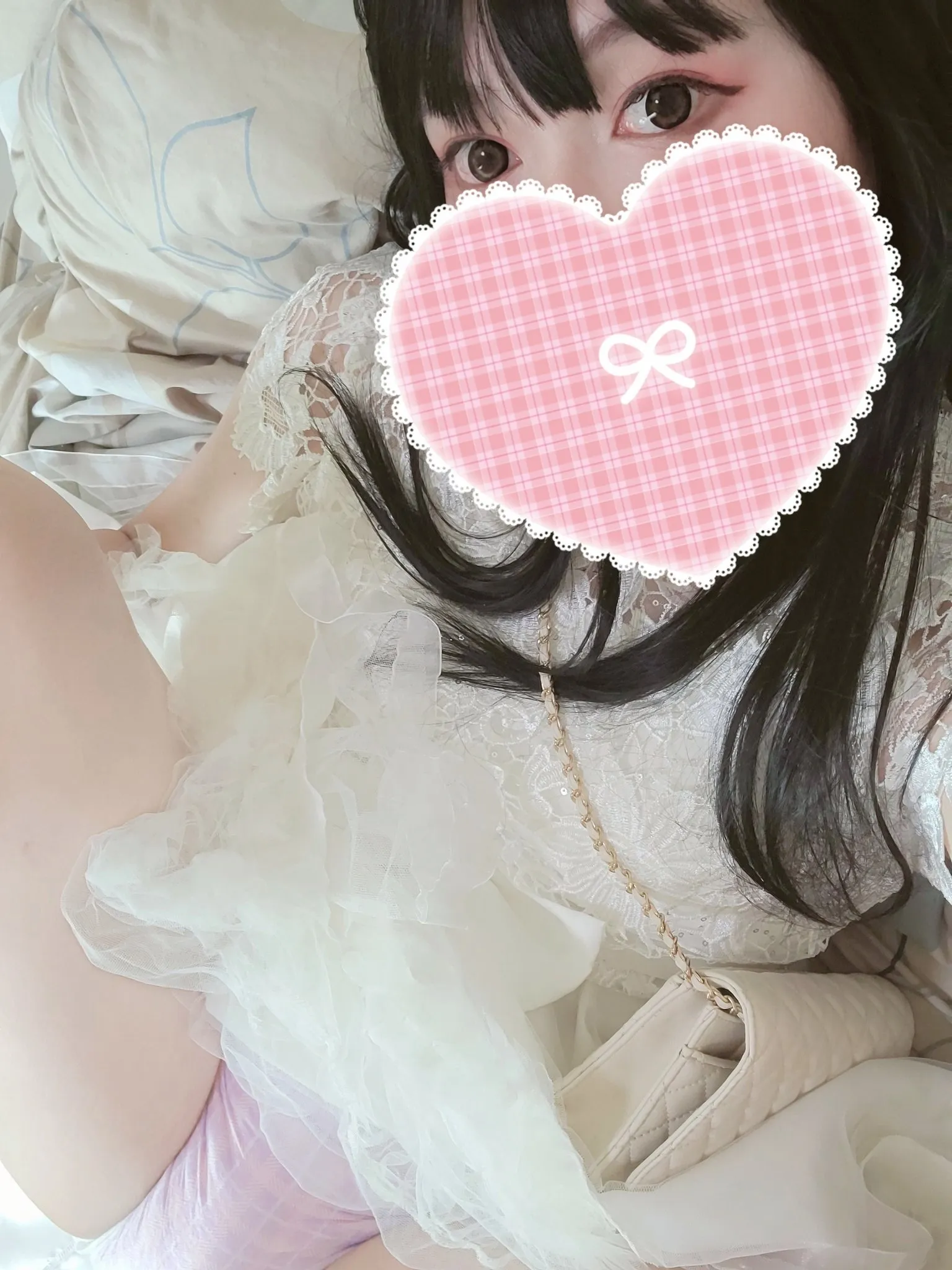 The ABDL girl lifts her white lace skirt to show off her Goodnight diaper.