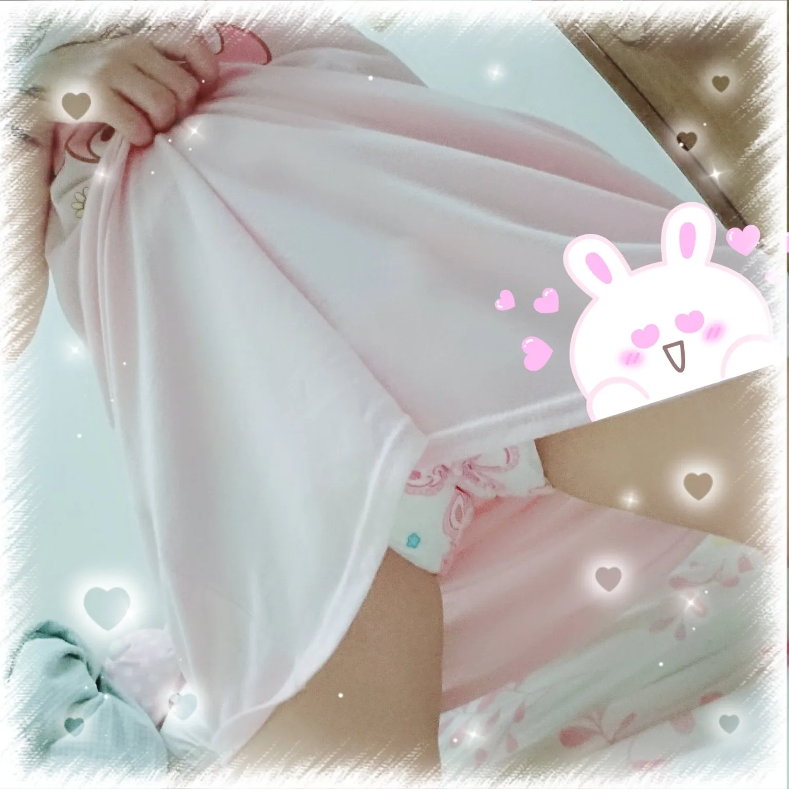 An ABDL girl lifts her skirt to show off her ABDL diaper.