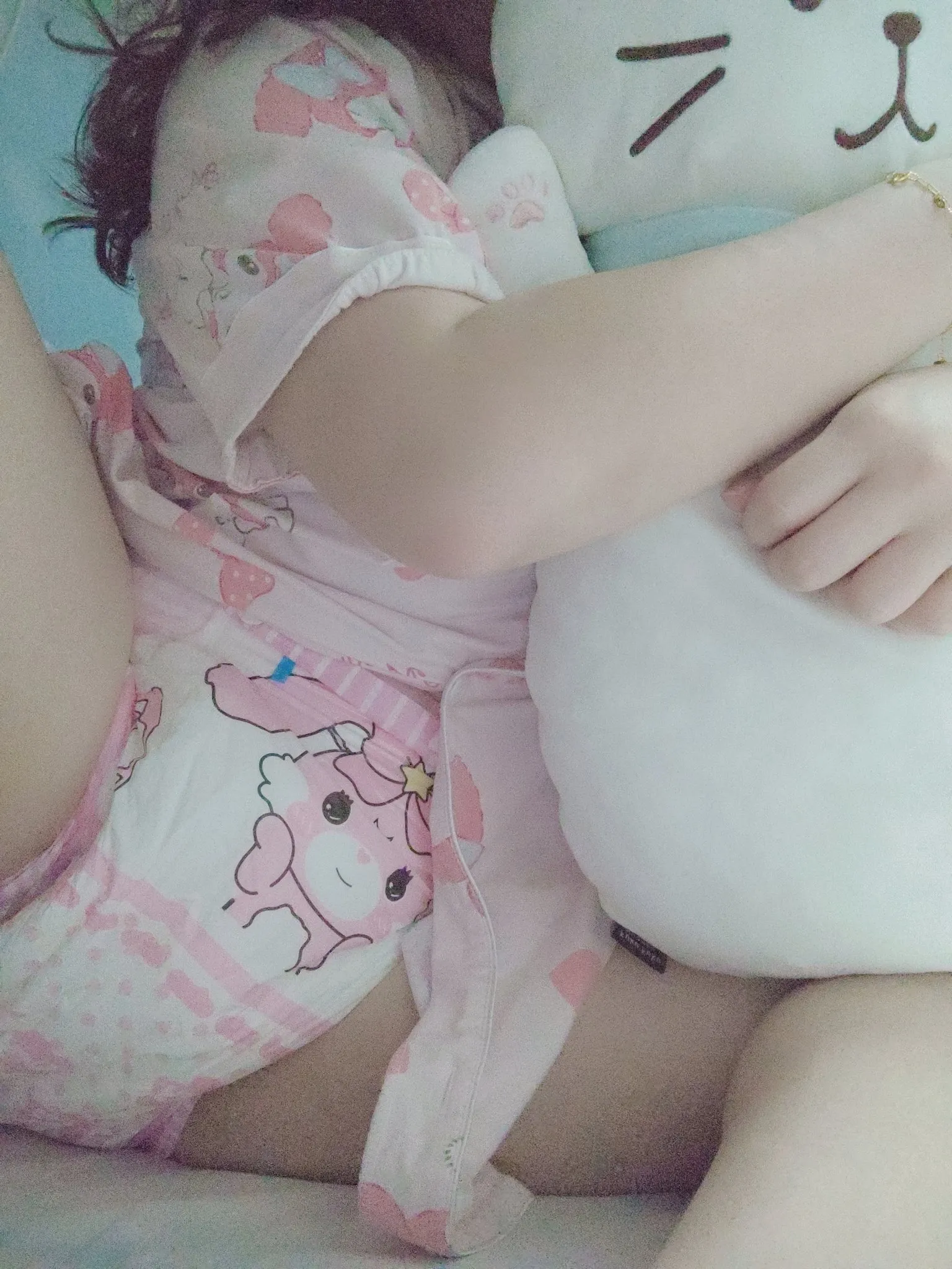 An ABDL girl shows off in her pajamas and bunny hops diapers.