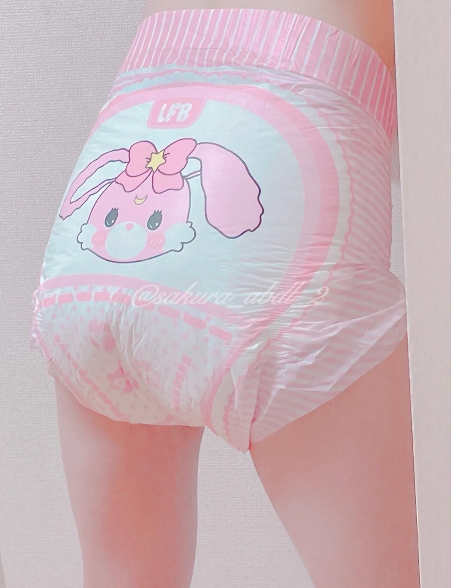 The ABDL girl with a backside that looks great in bunny diapers