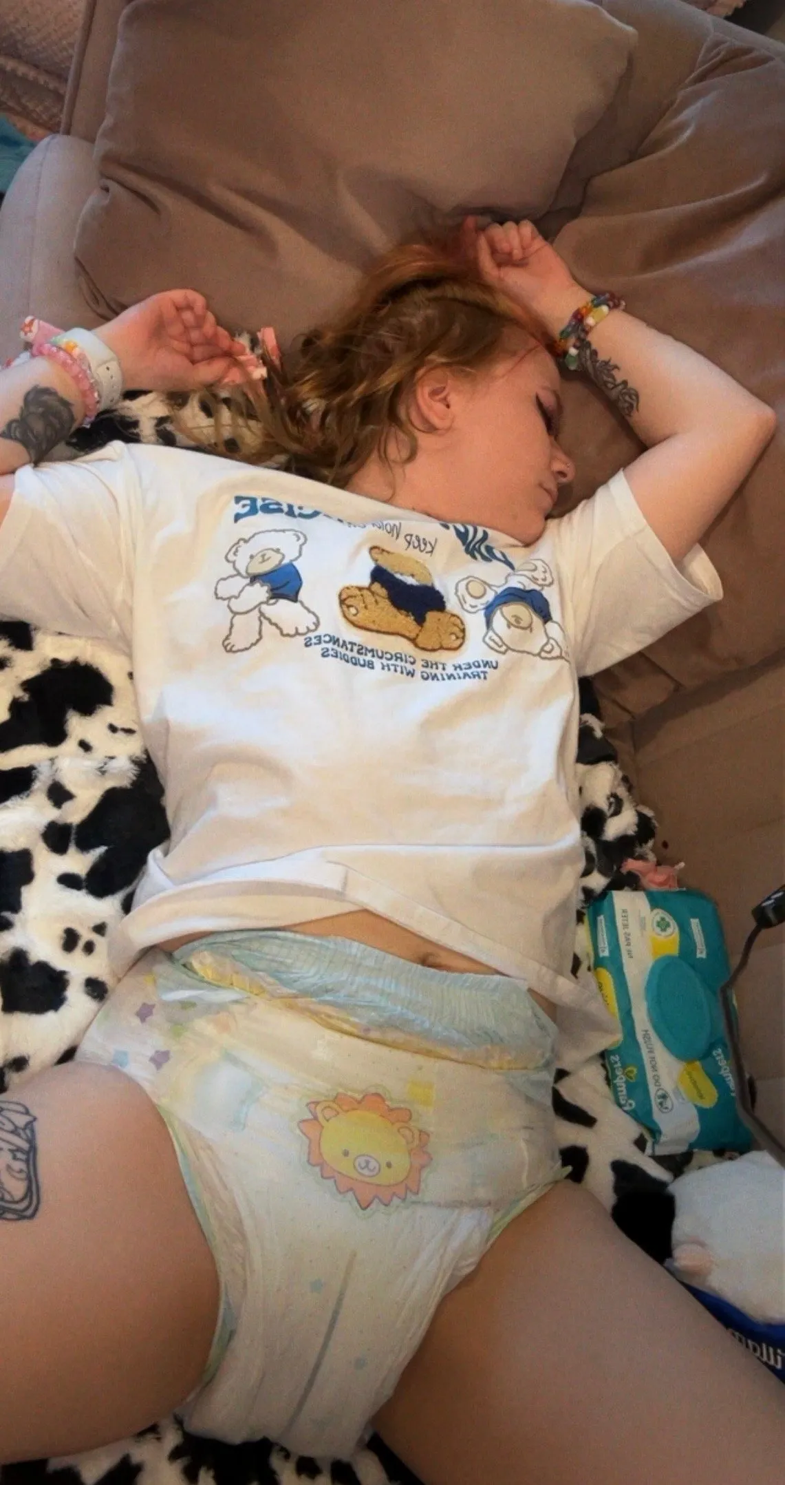 The ABDL girl's Try Again diaper is filled with pee.