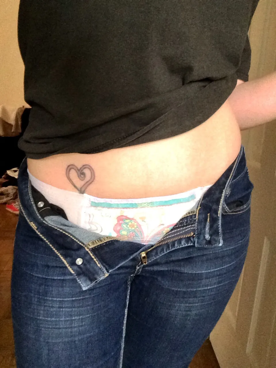 The ABDL woman is wearing diapers.