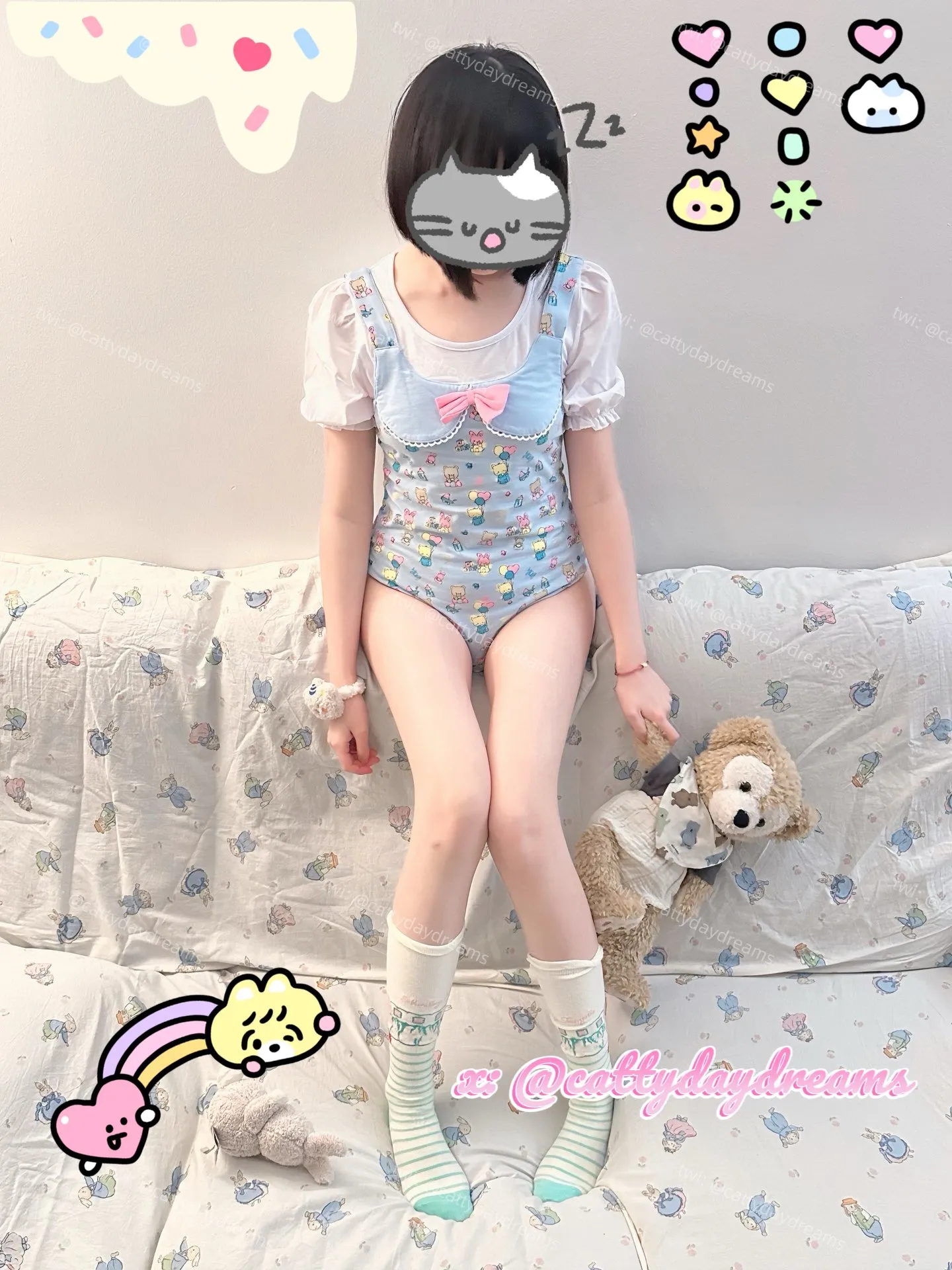 An ABDL girl is wearing a romper and holding a teddy bear.