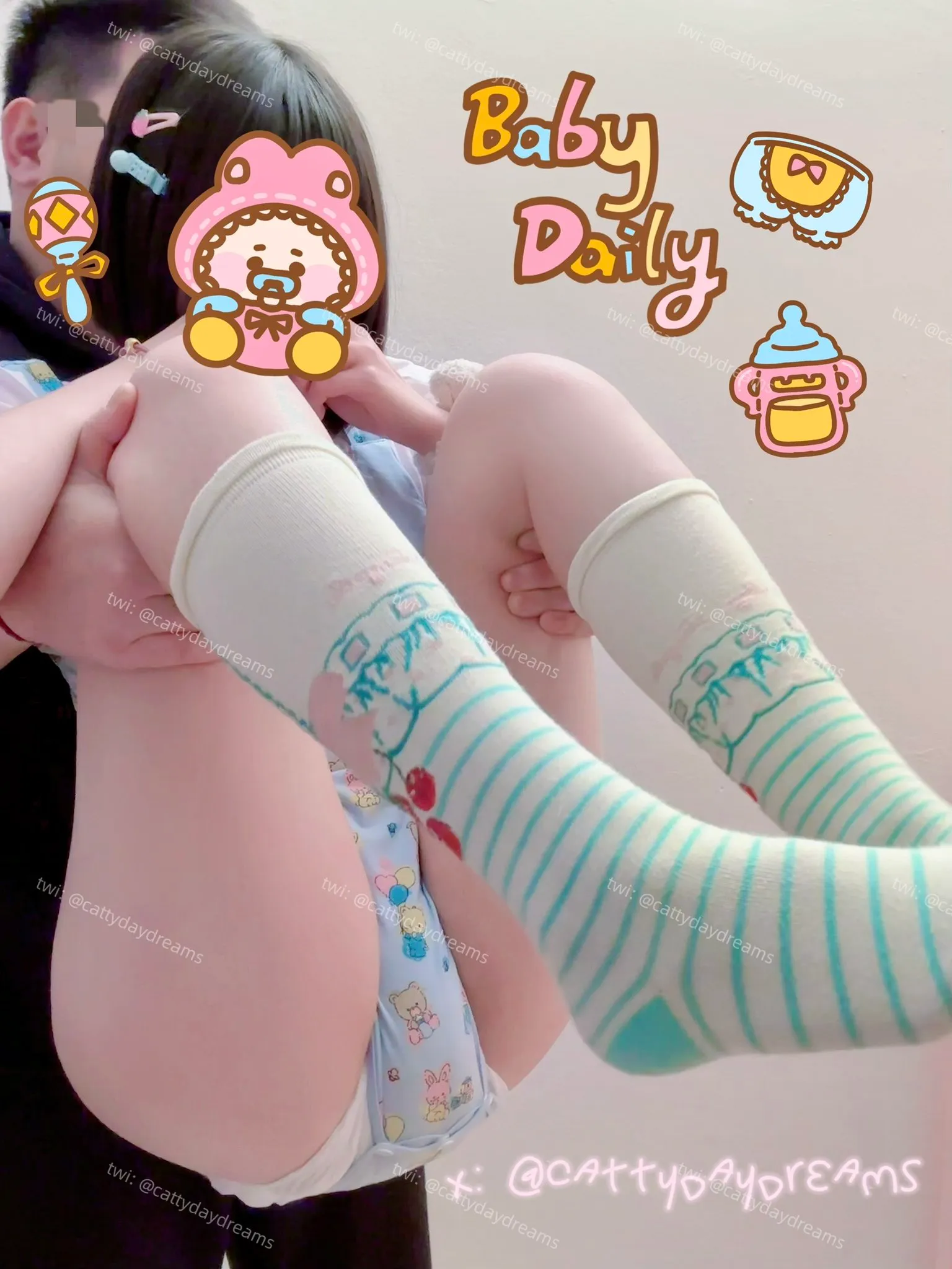 An ABDL girl is being held by a man in a squatting position to pee.