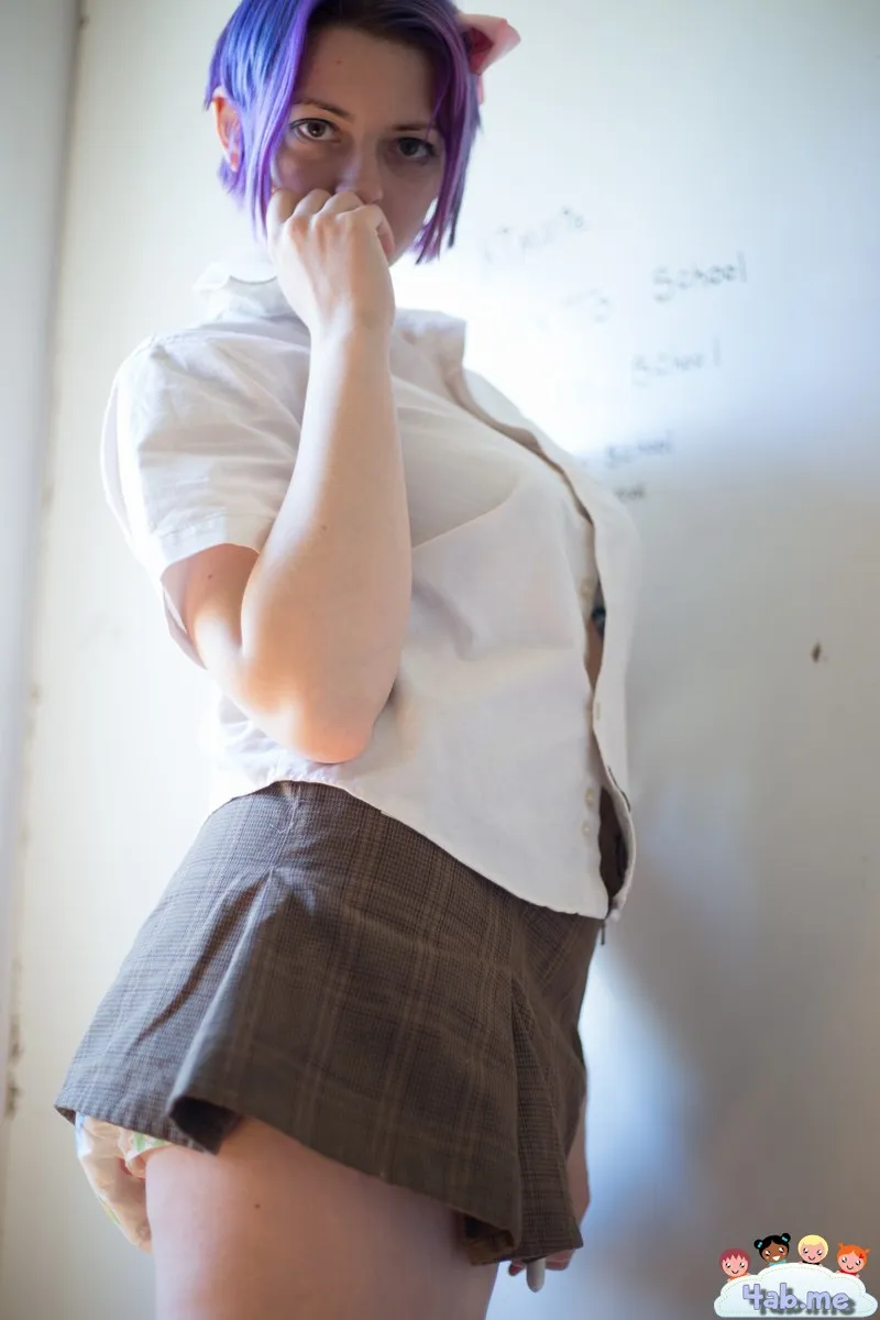 The purple-haired ABDL girl's diaper is visible under her skirt.